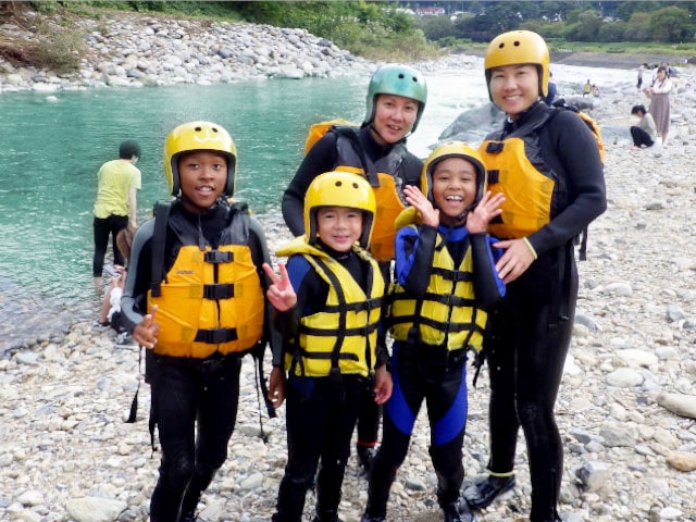 Floating on water with a life jacket.